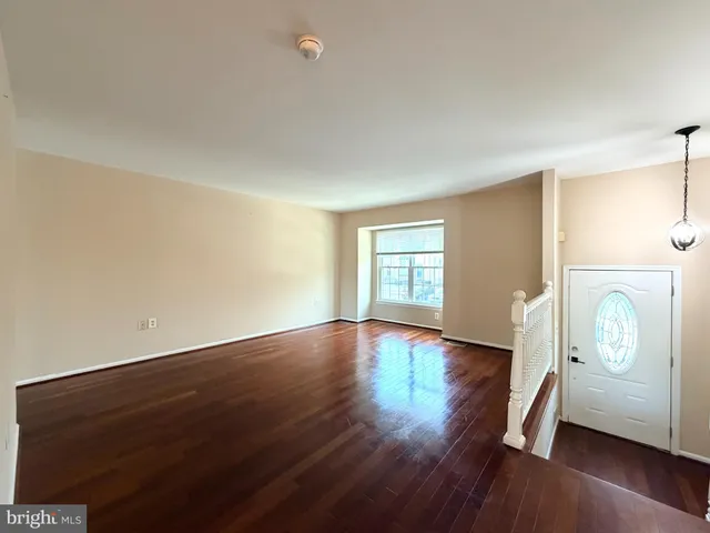a view of livingroom with hardwood floor and window