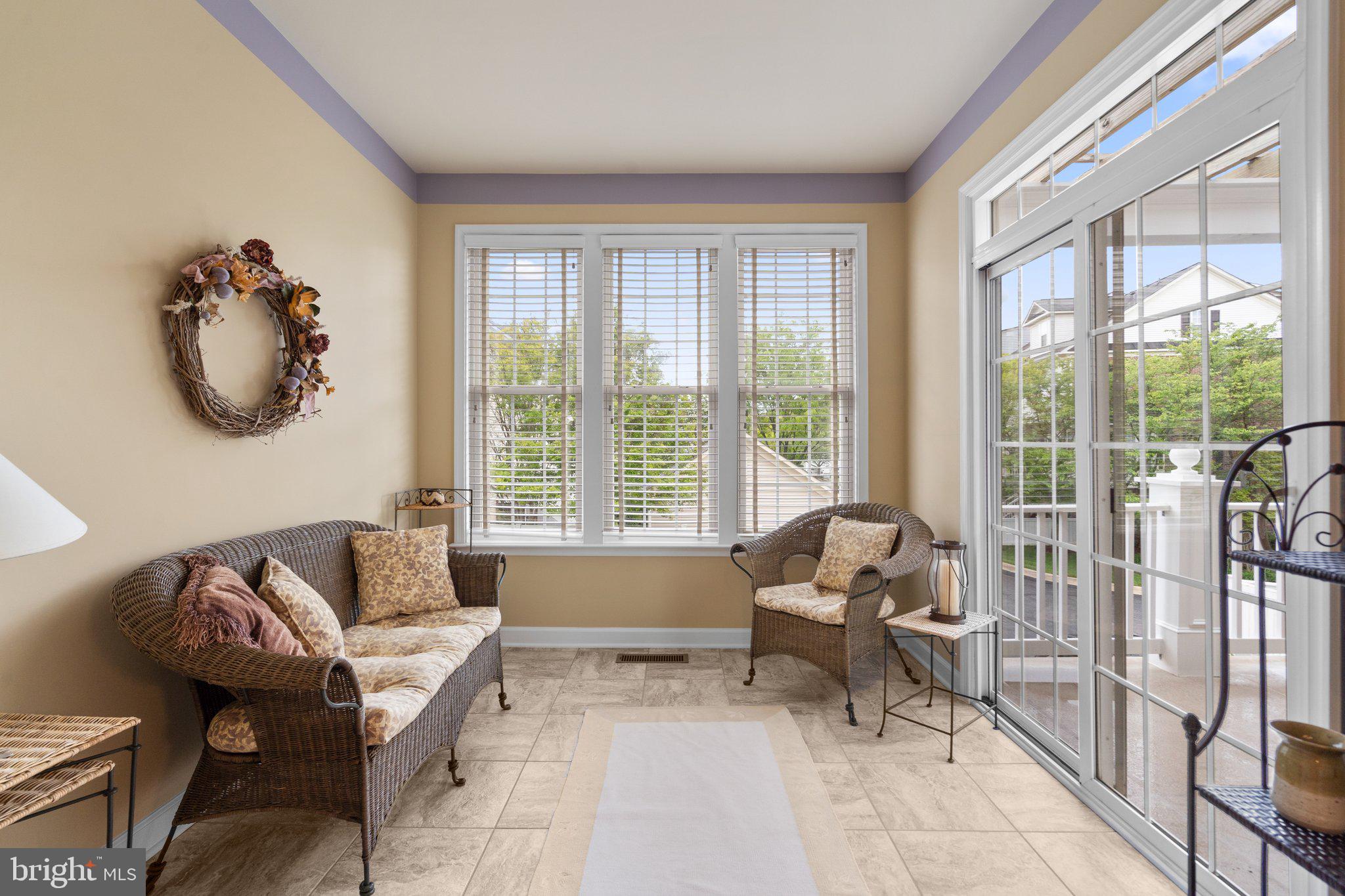 708 Ridgemont Avenue Rockville, MD 20850 - Photo 21 of 51 Sunroom with sliders to deck