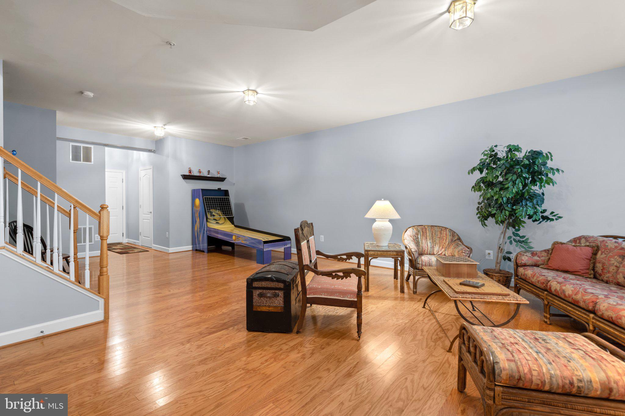 708 Ridgemont Avenue Rockville, MD 20850 - Photo 35 of 51 Large Recreation Room with hardwood flooring