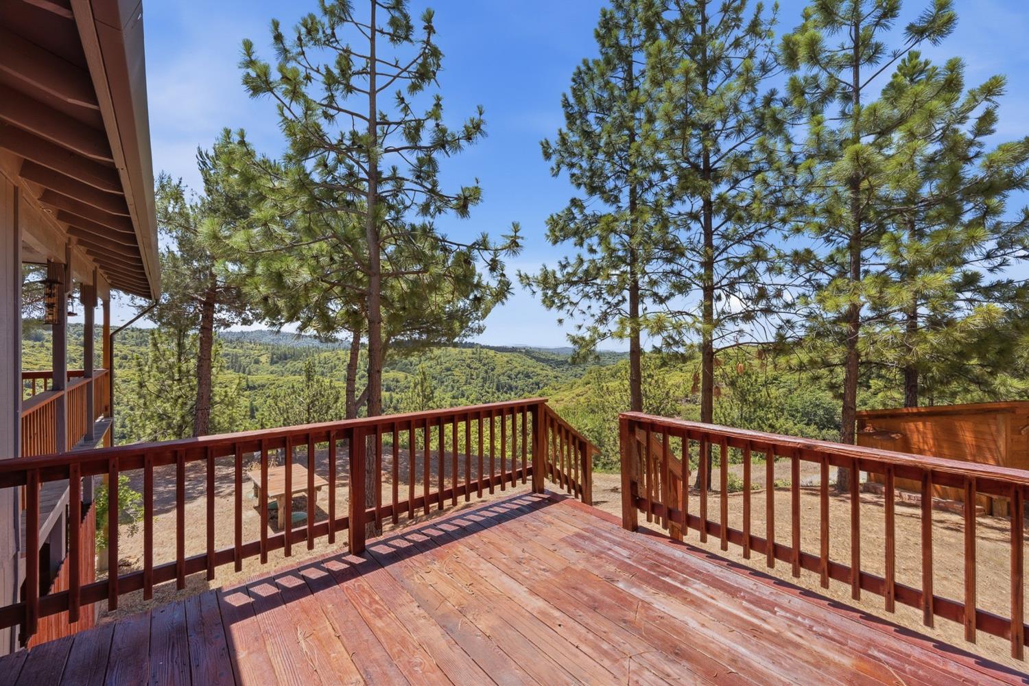 5595 Jasper-Ridge Murphys, CA 95247 - Photo 35 of 96 Spacious sundeck off the bedroom. Perfect place to enjoy morning coffee under the pines or add a jacuzzi.