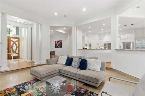 a living room with furniture and a couch