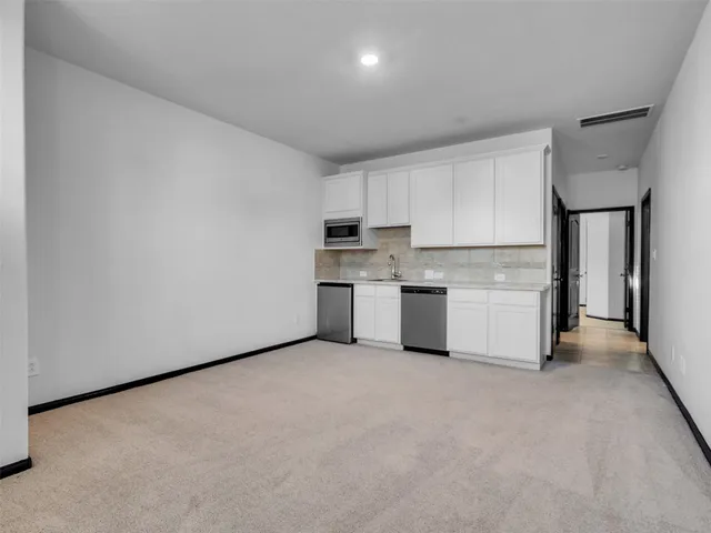 a bathroom with a double vanity sink mirror and double