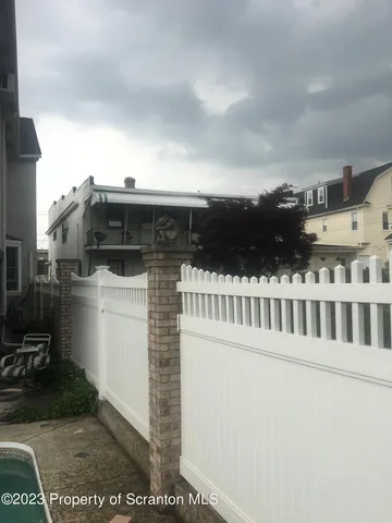 a view of outdoor space and kitchen floor