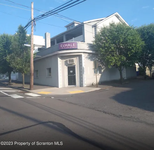a view of a house with a street