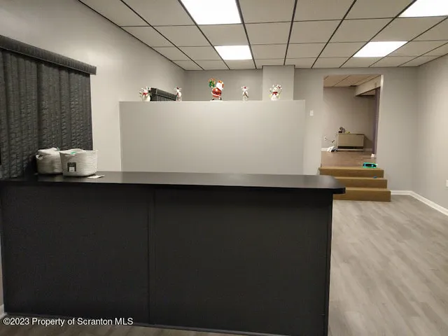 a kitchen with stainless steel appliances granite countertop a sink a stove and cabinets