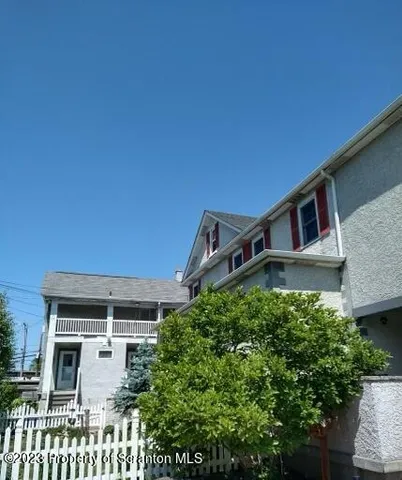 a house view with a outdoor space