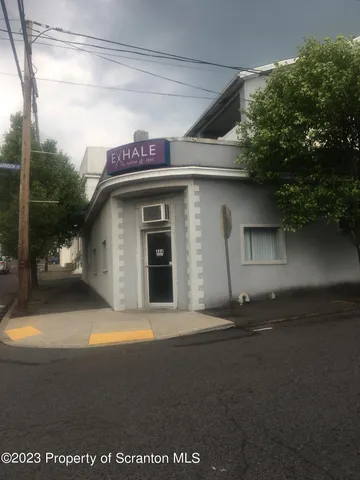 a view of swimming pool from a balcony