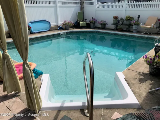 a view of livingroom with hardwood floor and a ceiling fan