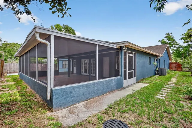 a swimming pool with wooden fence