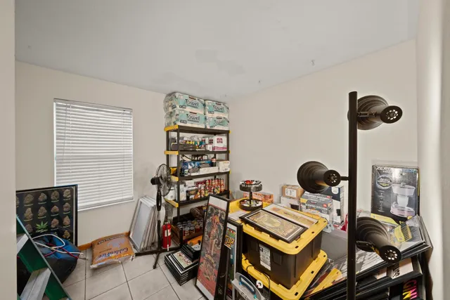 a view of a workspace with furniture