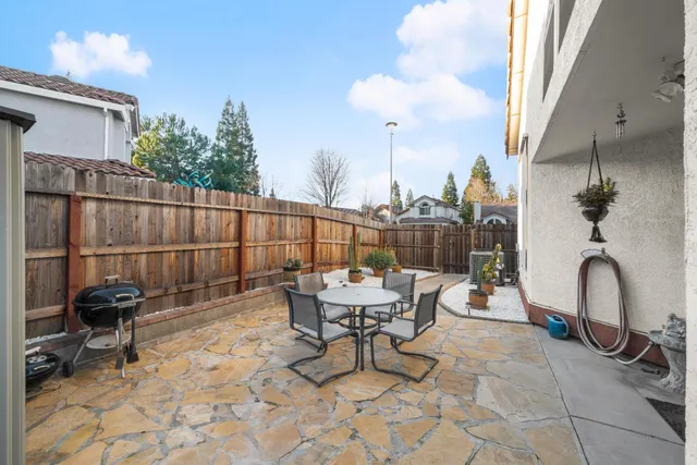 a building outdoor space with patio furniture