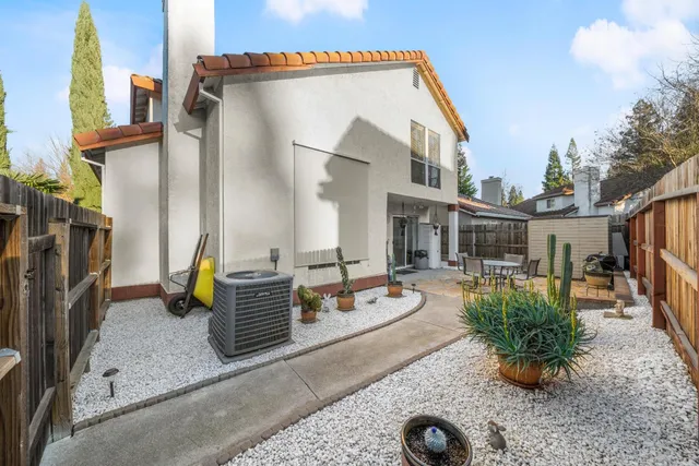 a view of a back yard of the house