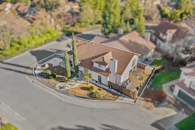 a view of a house with a swimming pool