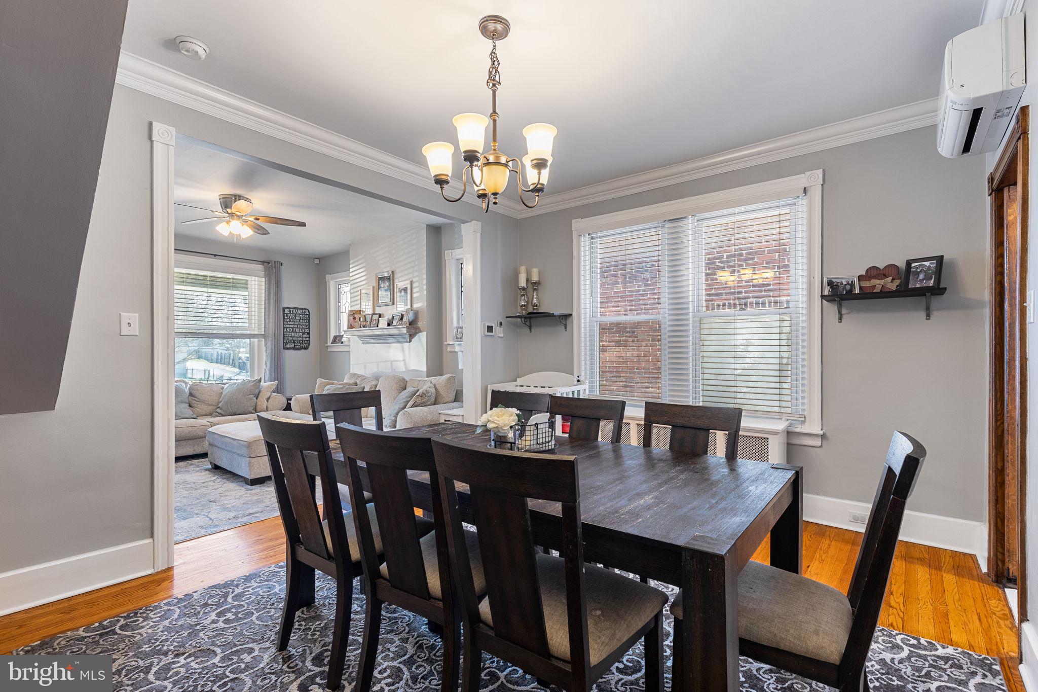 820 Maple Street Conshohocken, PA 19428 - Photo 13 of 43 a view of a dining room with furniture and a chandelier