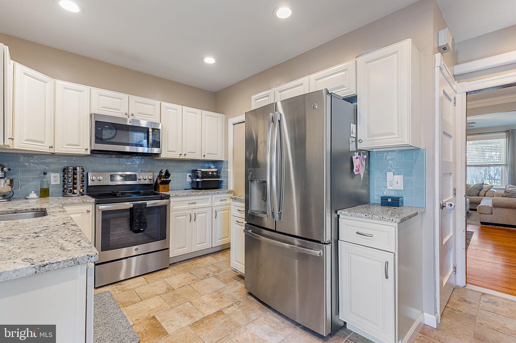 820 Maple Street Conshohocken, PA 19428 - Photo 15 of 43 a kitchen with a refrigerator sink and microwave