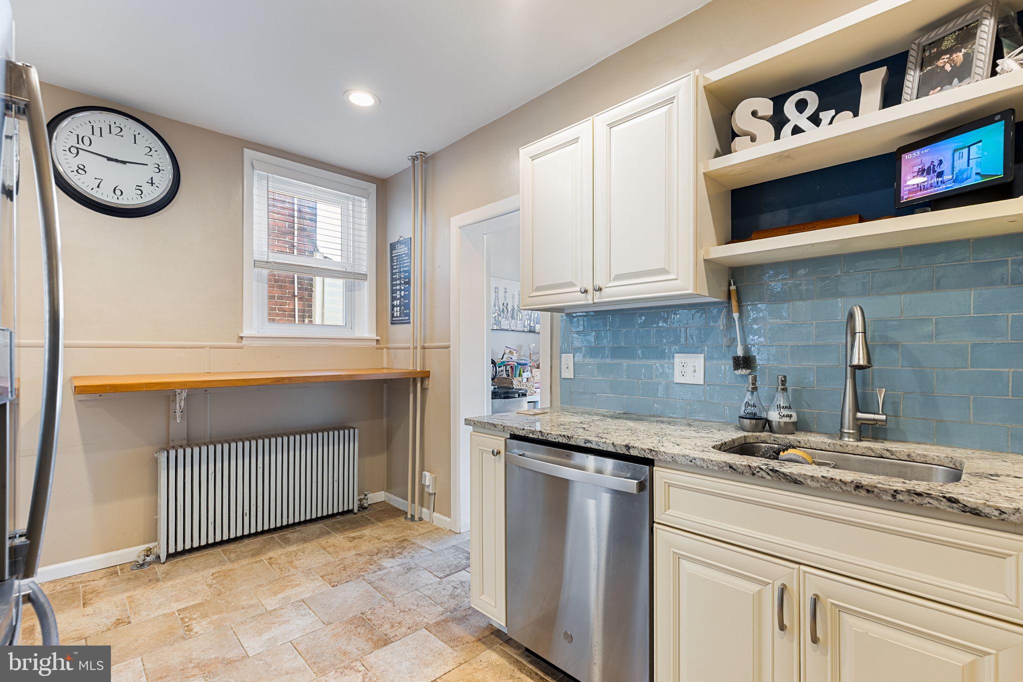 820 Maple Street Conshohocken, PA 19428 - Photo 18 of 43 a kitchen with stainless steel appliances granite countertop a sink and a cabinets