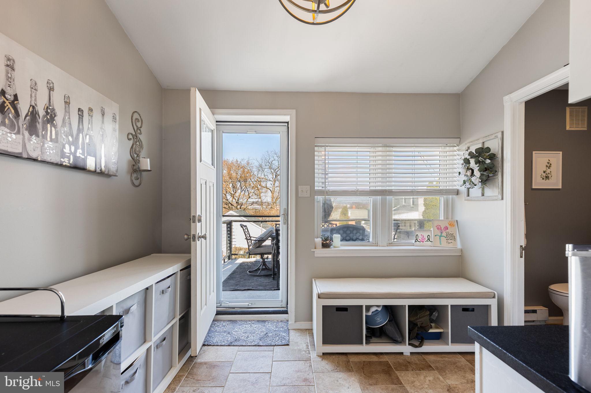820 Maple Street Conshohocken, PA 19428 - Photo 22 of 43 a kitchen with stainless steel appliances granite countertop a stove and a microwave