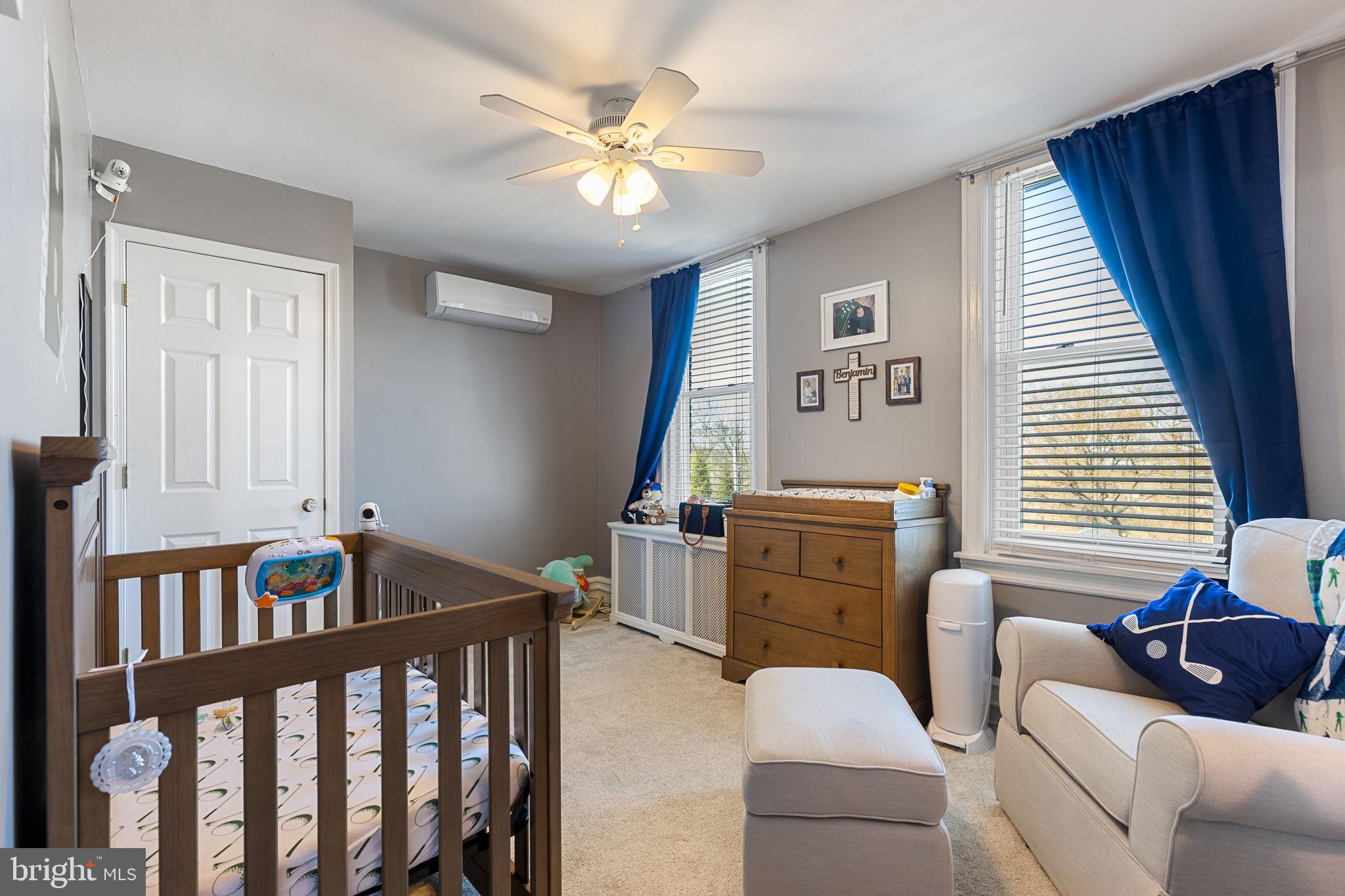 820 Maple Street Conshohocken, PA 19428 - Photo 32 of 43 a bedroom with furniture and wooden floor