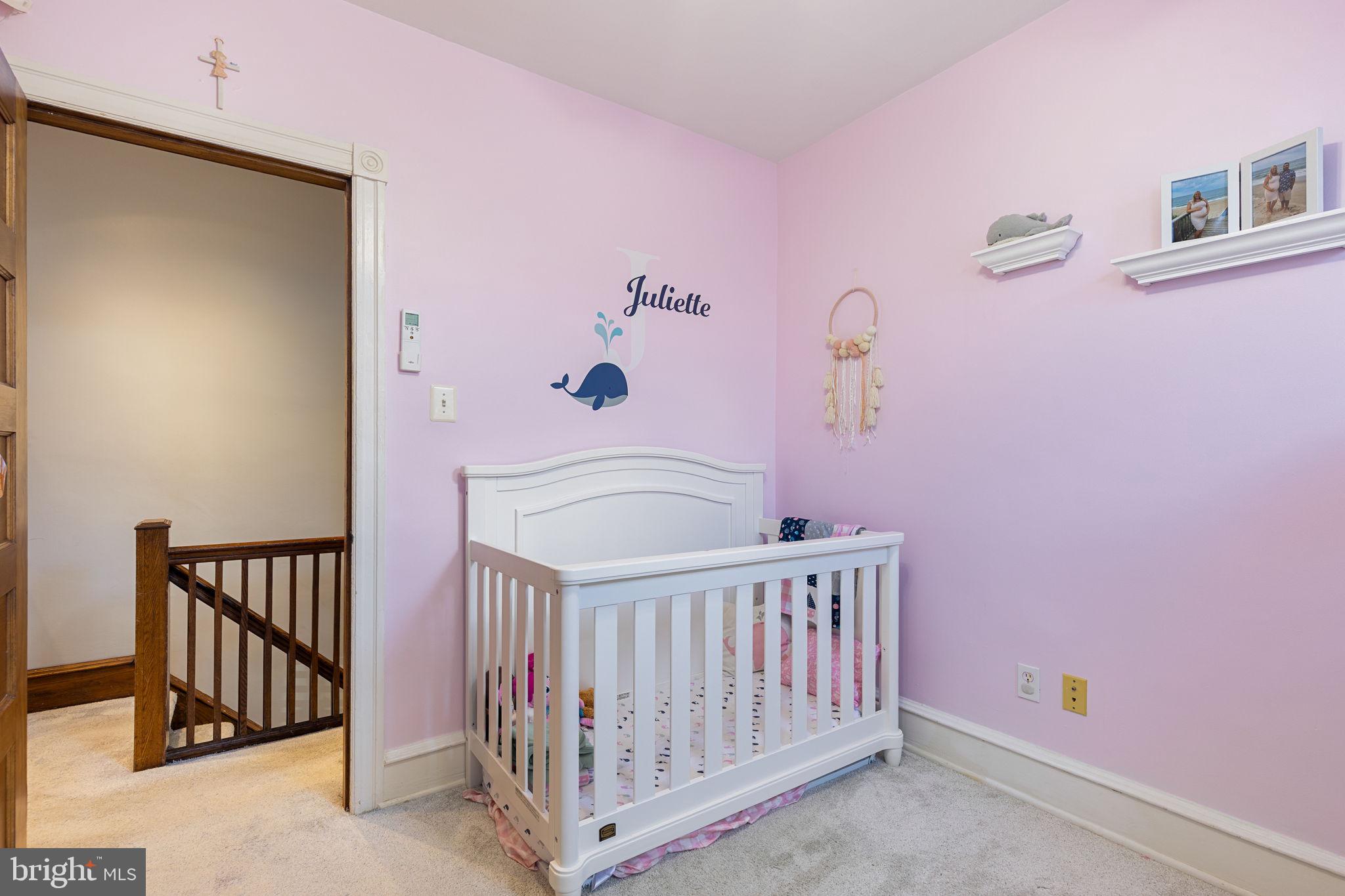 820 Maple Street Conshohocken, PA 19428 - Photo 35 of 43 a view of a bedroom with baby crib