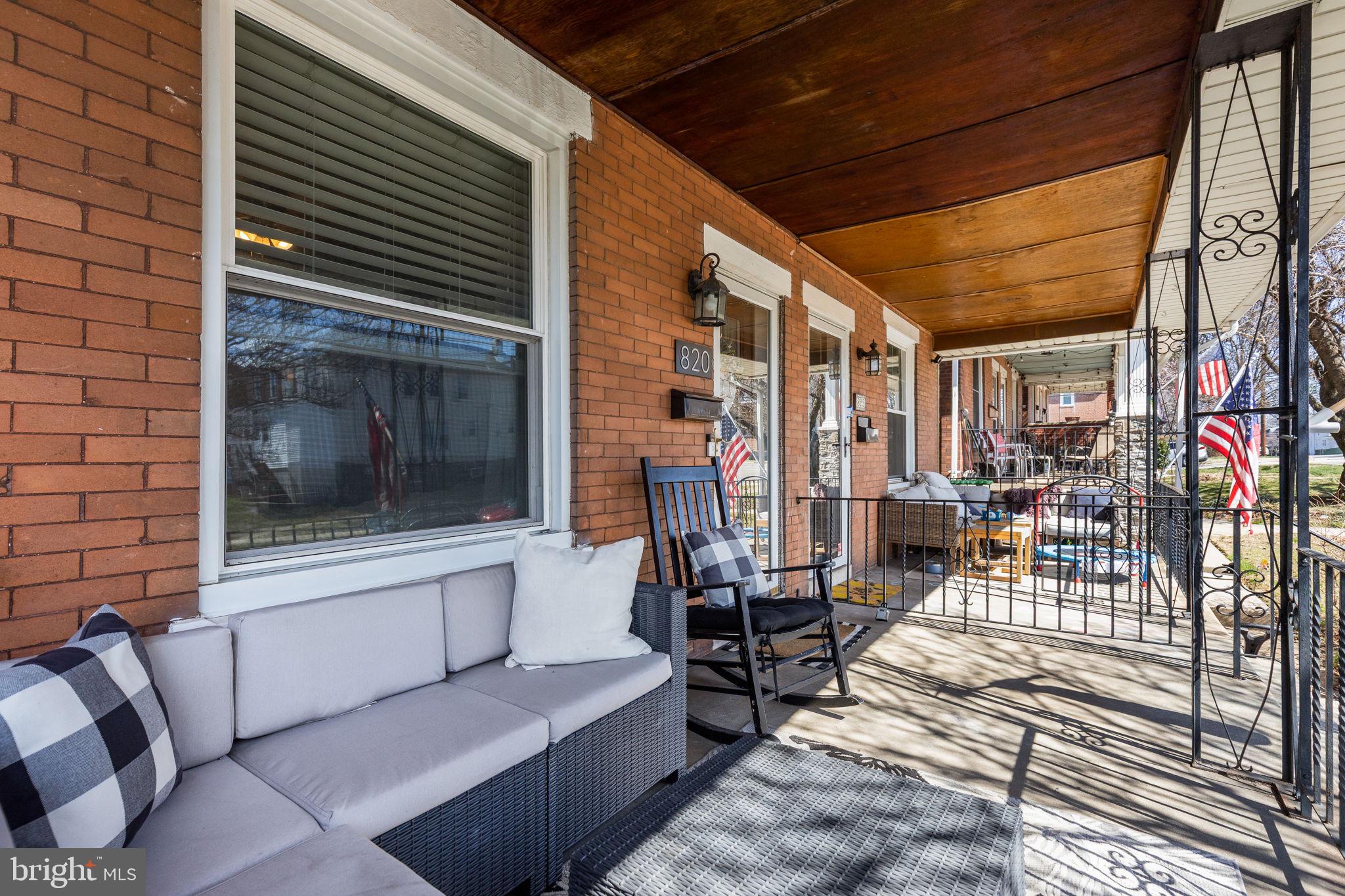 820 Maple Street Conshohocken, PA 19428 - Photo 4 of 43 a outdoor living space with patio furniture and a fireplace