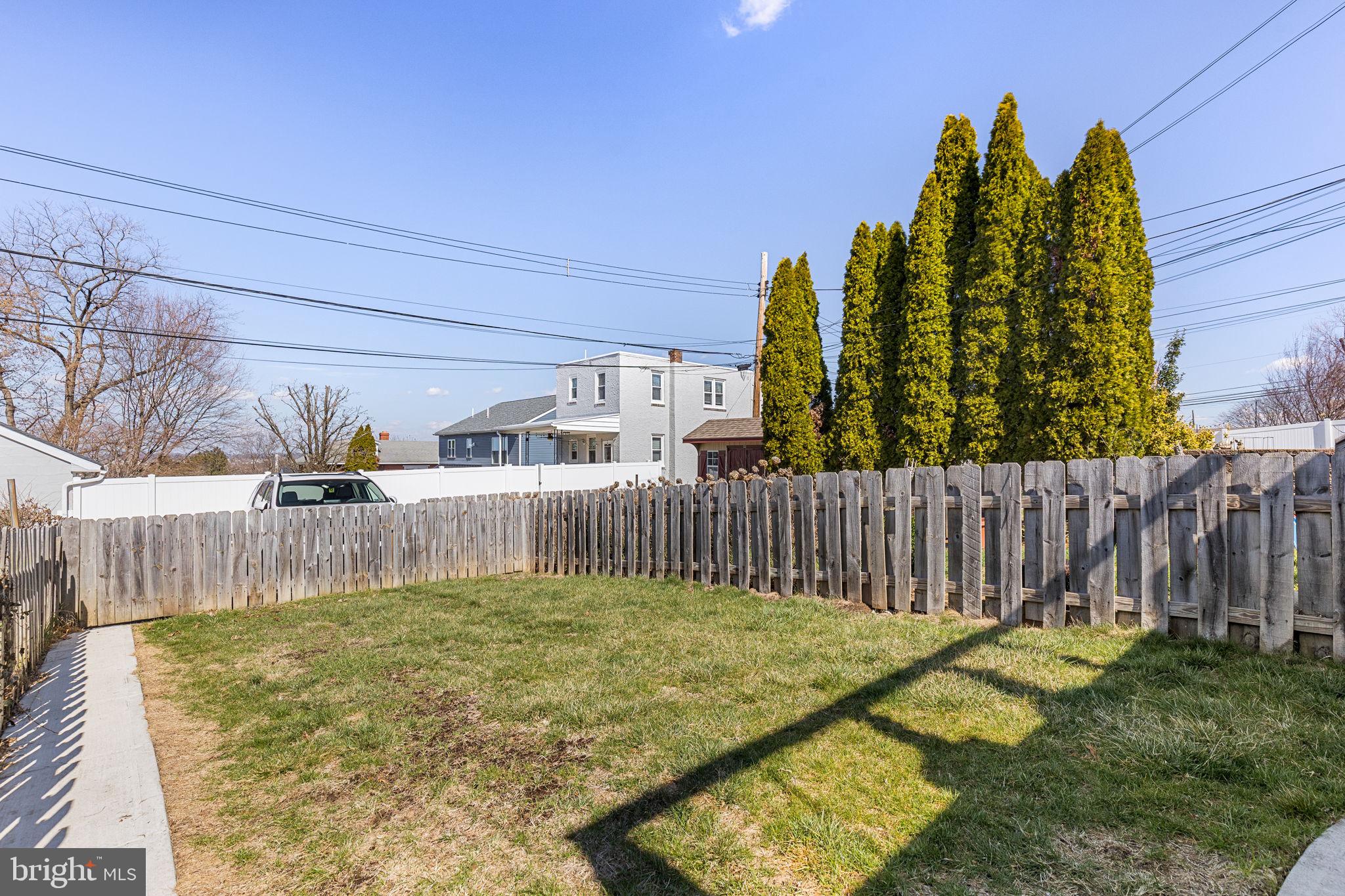 820 Maple Street Conshohocken, PA 19428 - Photo 42 of 43 a front view of a house with a garden