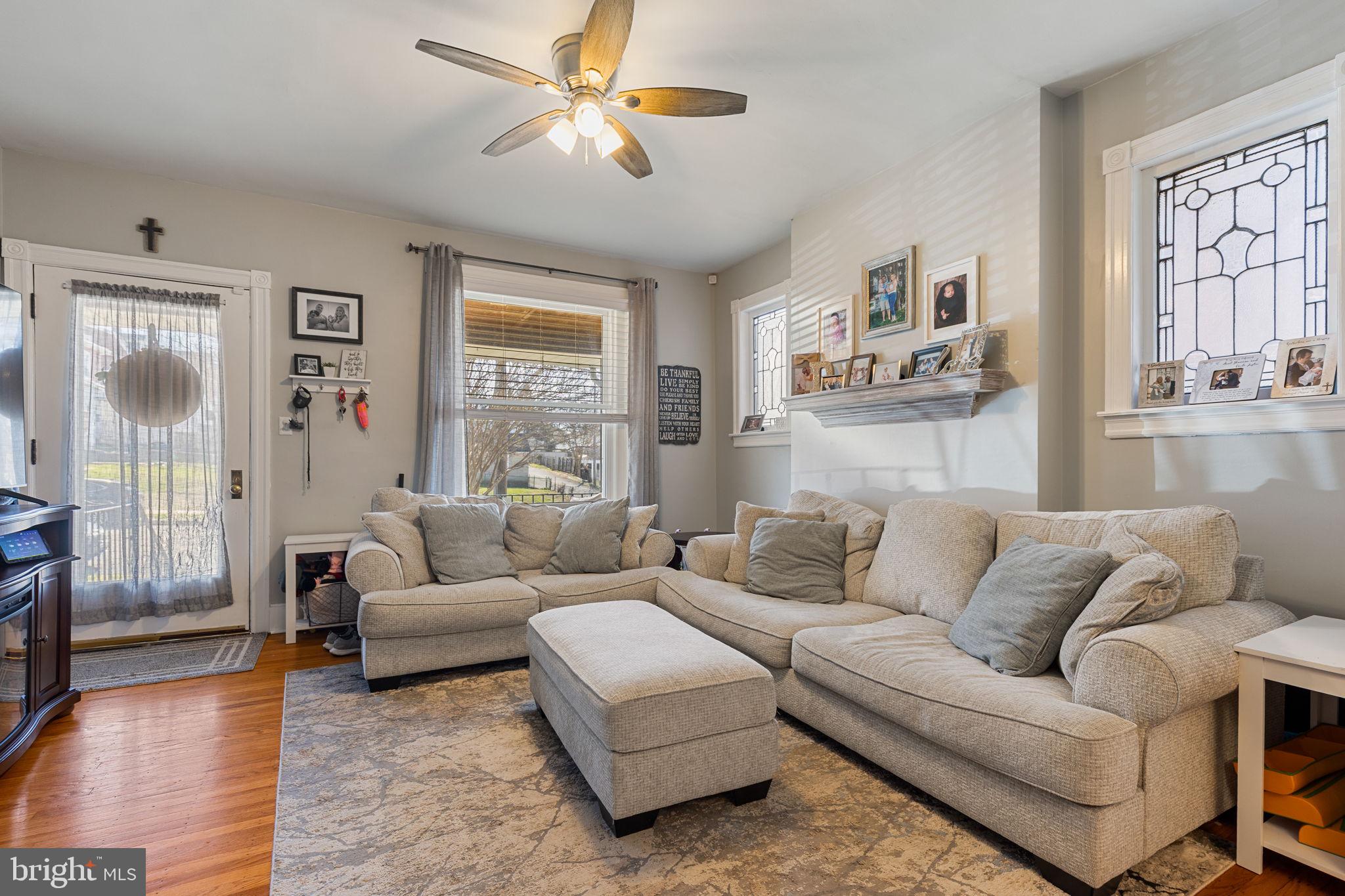 820 Maple Street Conshohocken, PA 19428 - Photo 6 of 43 a living room with furniture and a large window