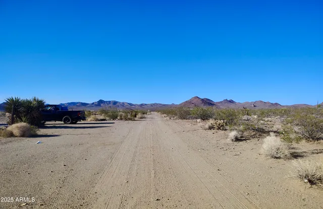a view of mountain with sunset view
