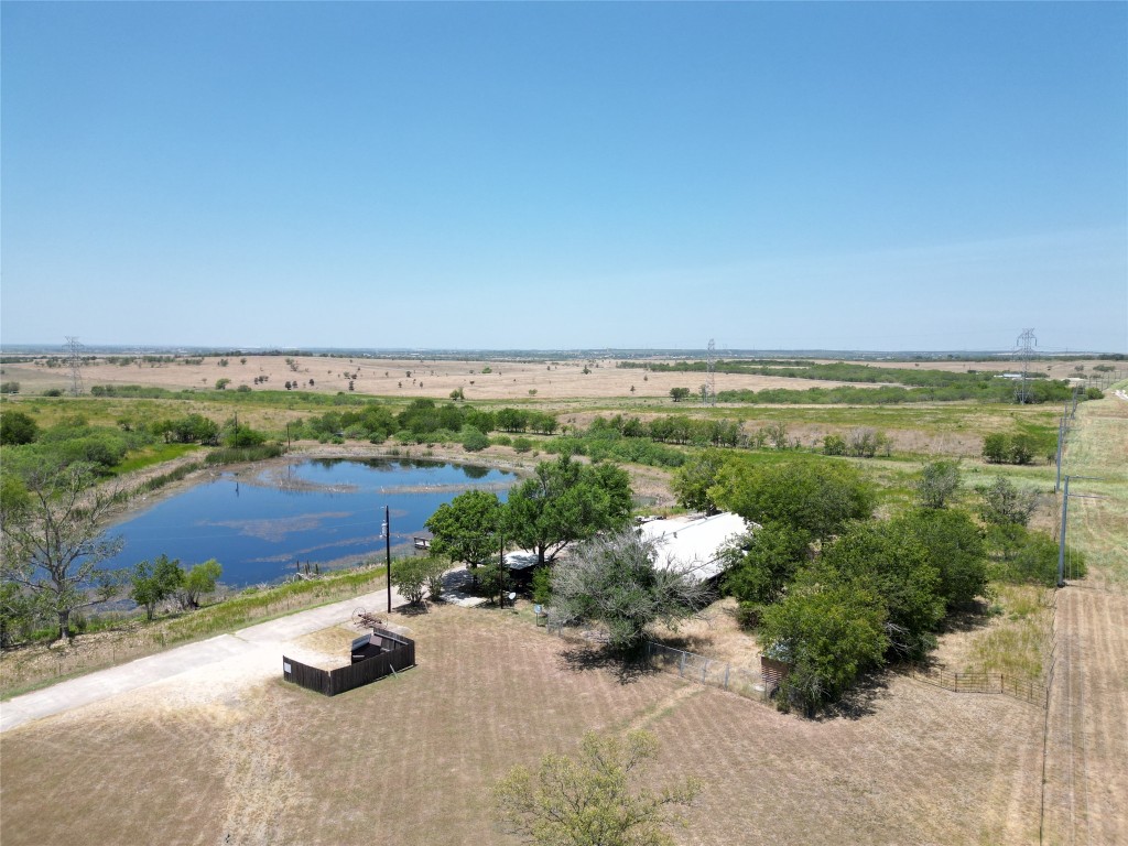 Tbd Tbd Bluebonnet Road Lockhart, TX 78644 - Photo 2 of 32 an aerial view of a houses with outdoor space