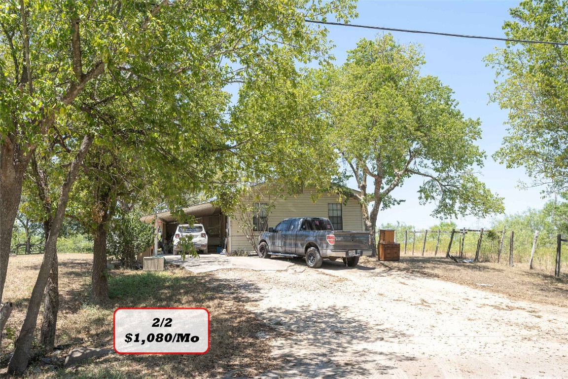 Tbd Tbd Bluebonnet Road Lockhart, TX 78644 - Photo 21 of 32 a view of road with trees in the background