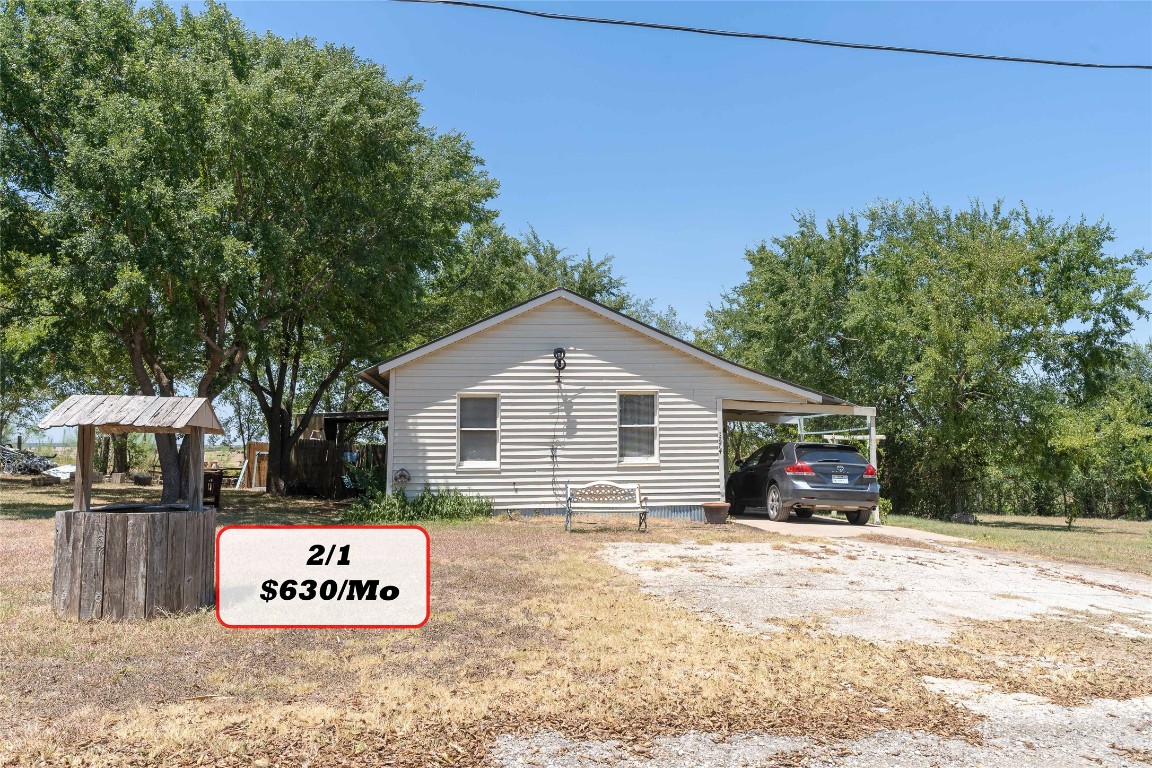 Tbd Tbd Bluebonnet Road Lockhart, TX 78644 - Photo 25 of 32 a view of a house with a yard covered in snow