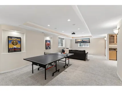 a living room with furniture and a table