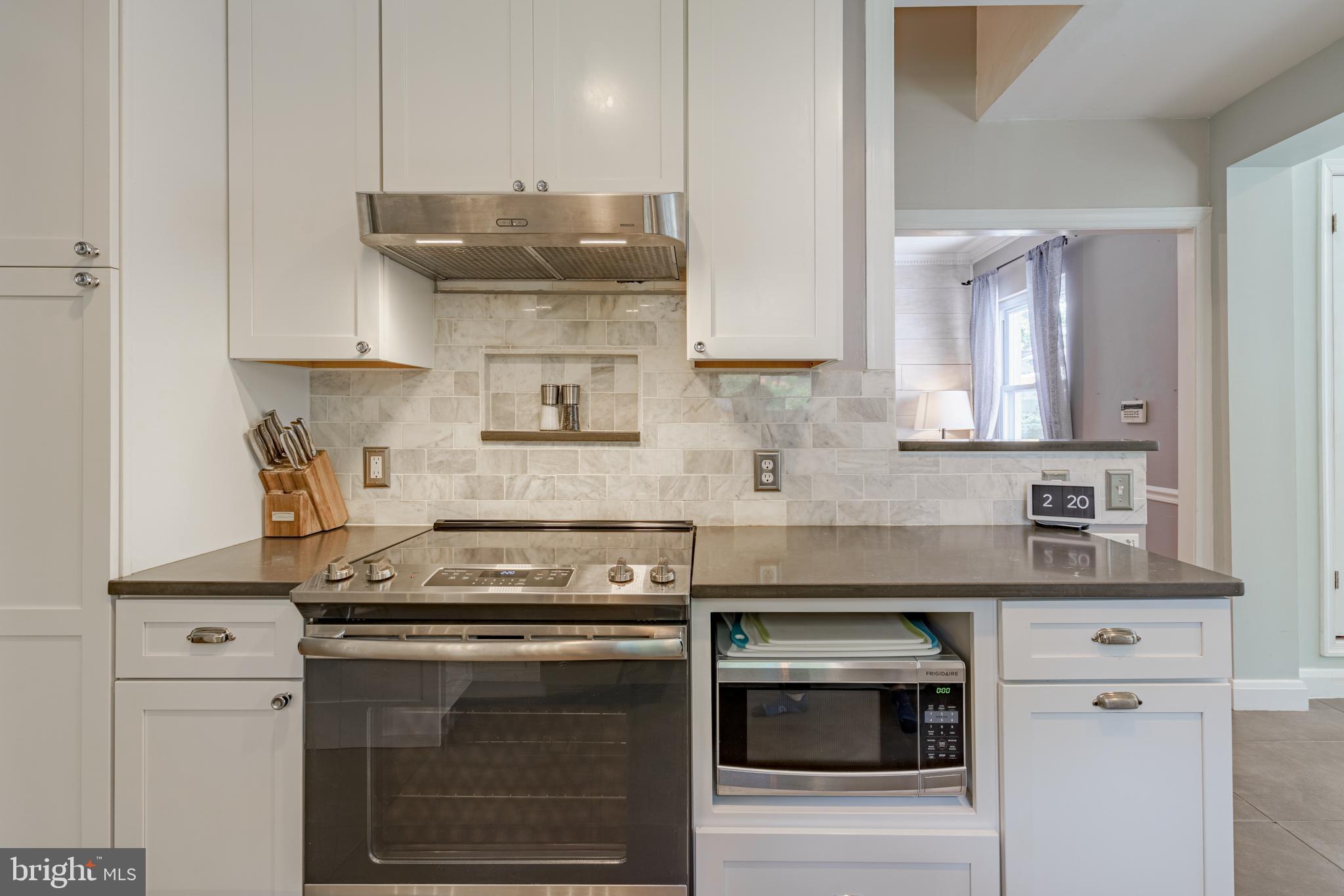 7110 Bristol Road Baltimore, MD 21212 - Photo 18 of 58 Under mounted lighting and soft close cabinets.