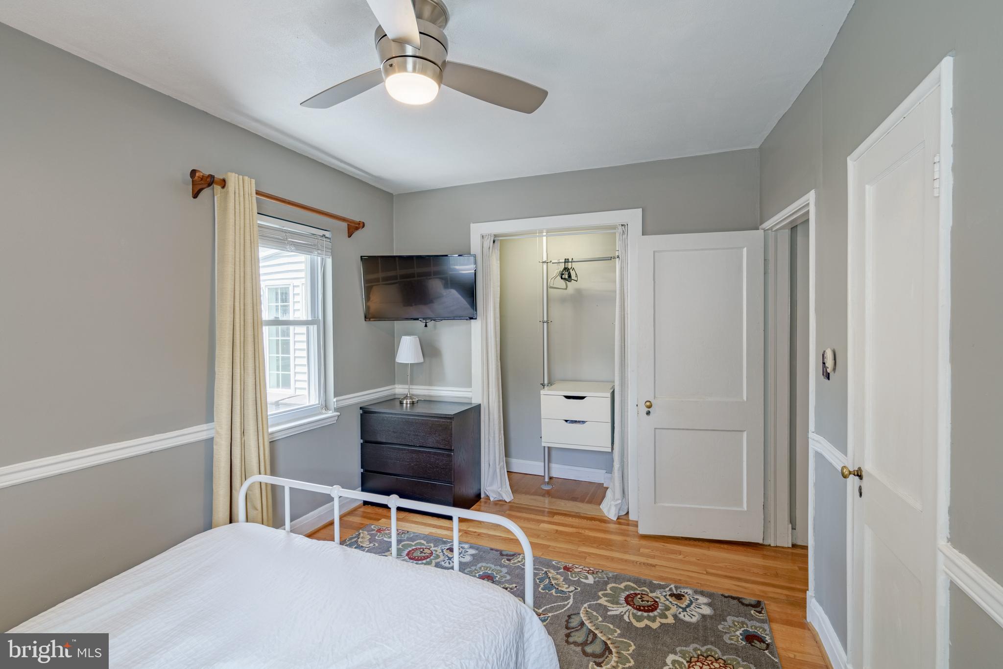 7110 Bristol Road Baltimore, MD 21212 - Photo 24 of 58 New ceiling fan and two windows.