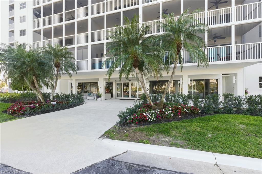 1 Bluebill Avenue, Unit 605 Naples, FL 34108 - Photo 3 of 20 View of apartment building / complex with concrete driveway