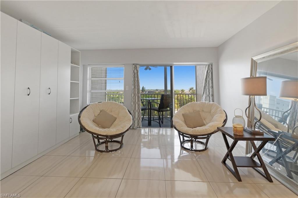 1 Bluebill Avenue, Unit 605 Naples, FL 34108 - Photo 9 of 20 Sitting room featuring light tile patterned floors