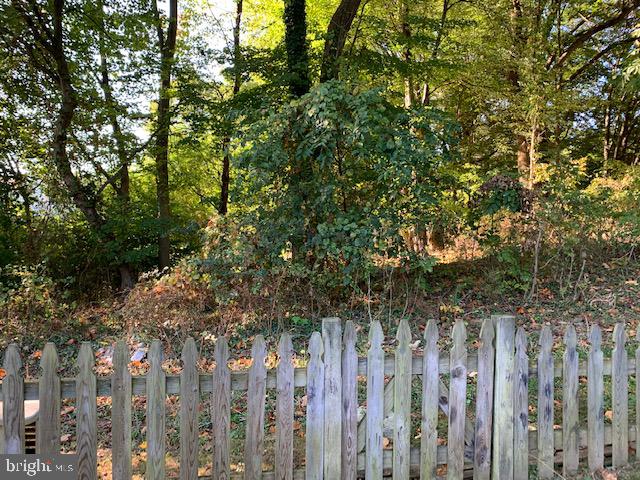 15717 Haynes Road Laurel, MD 20707 - Photo 41 of 46 Backyard fence and trees