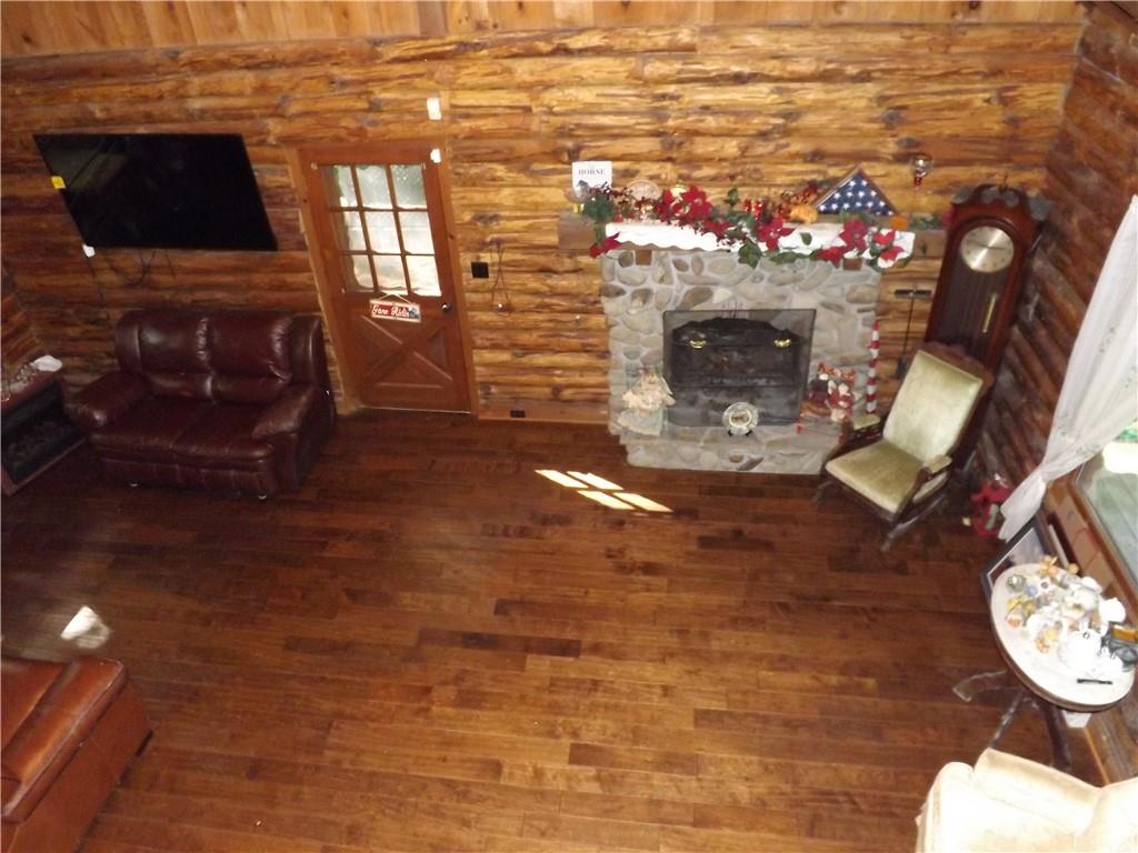 167 Bonniebrook Road Butler, PA 16002 - Photo 12 of 25 a living room with fireplace furniture and a fireplace