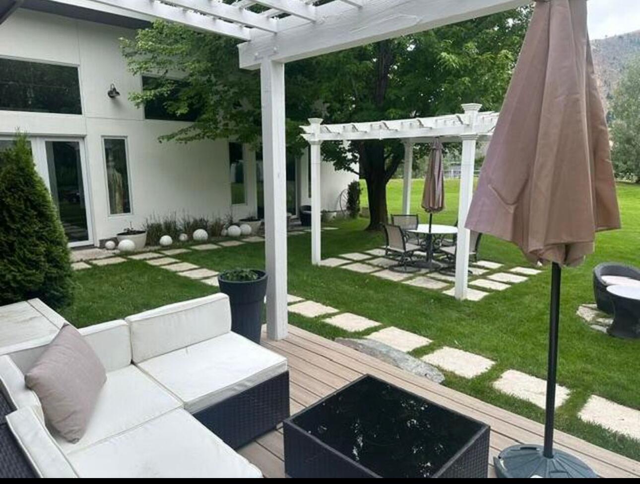 823 Buttercup Road Blaine County, ID 83333 - Photo 1 of 37 Deck, studio, pergola and backyard
