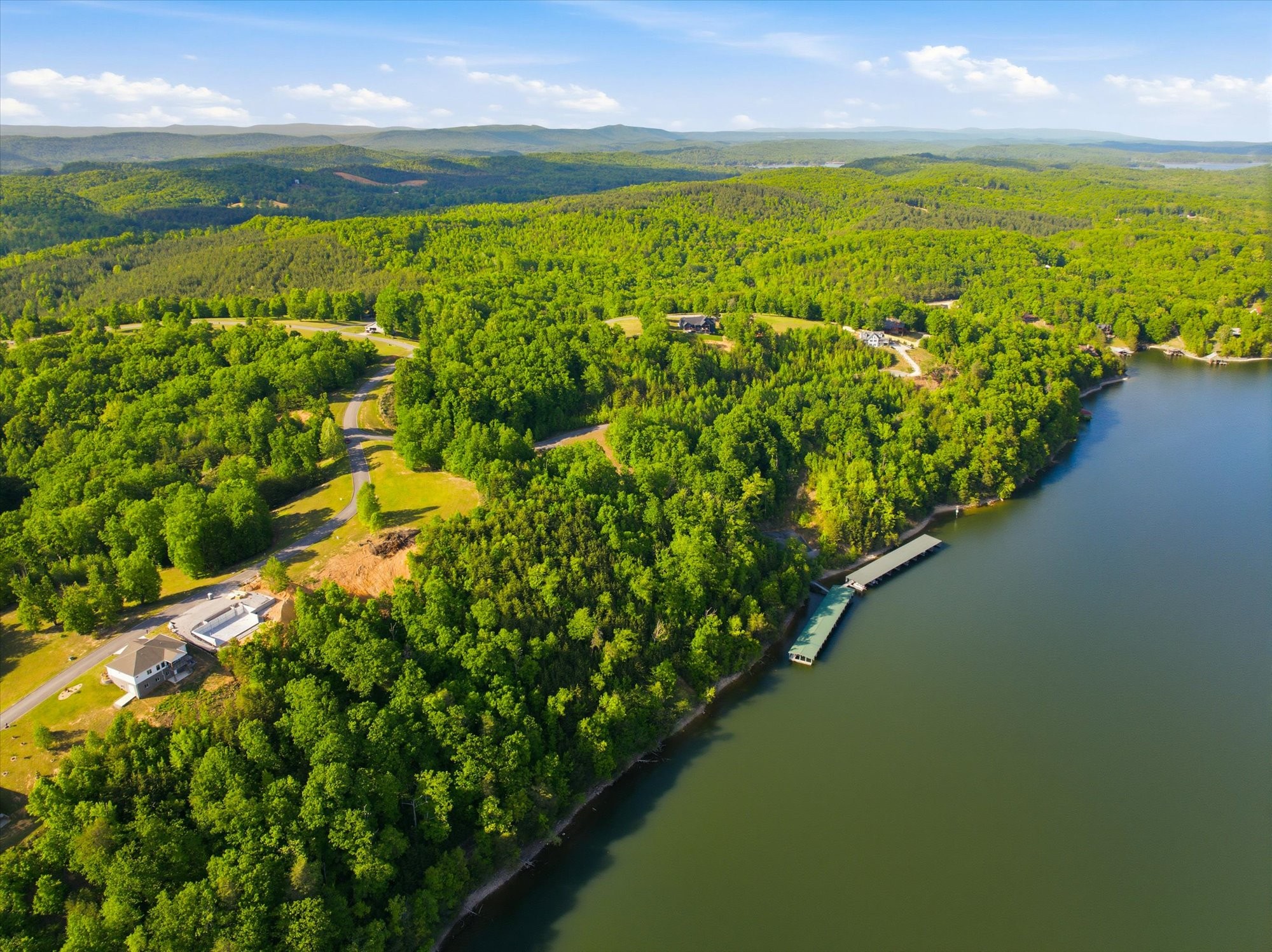 240 River Run Trail Spring City, TN 37381 - Photo 14 of 24 a view of an ocean and a mountain
