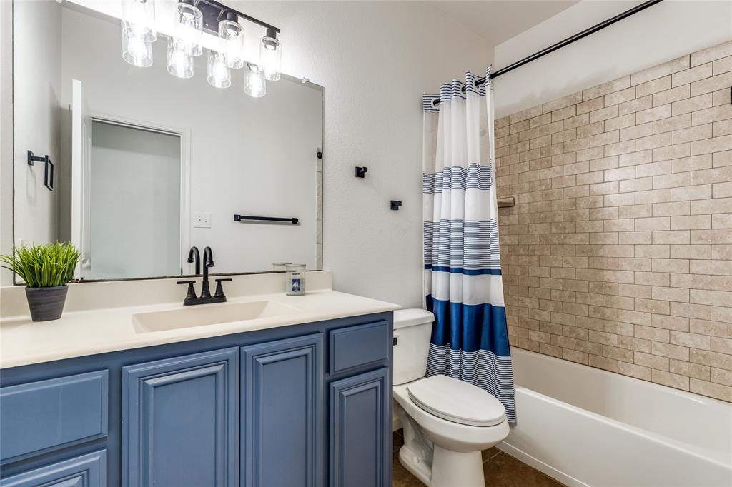 1800 Rodeo Drive Anna, TX 75409 - Photo 27 of 33 Upstairs full bath joins the flex space and bedroom.