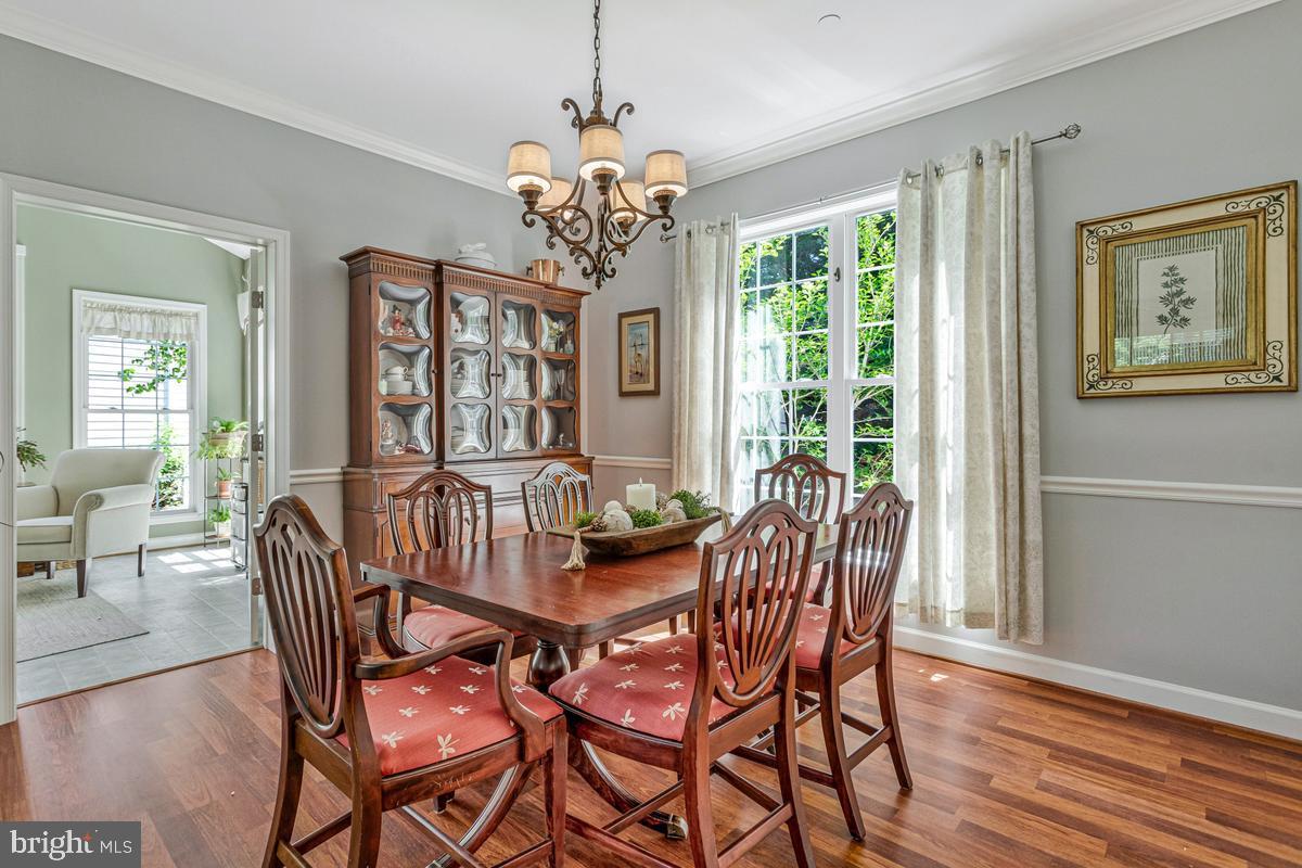 11565 Magnolia Court Issue, MD 20645 - Photo 25 of 68 a view of a dining room with furniture window and wooden floor