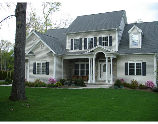 1340 Piper Road West Springfield, MA 01089 - Photo 1 of 10 a front view of a house with a yard