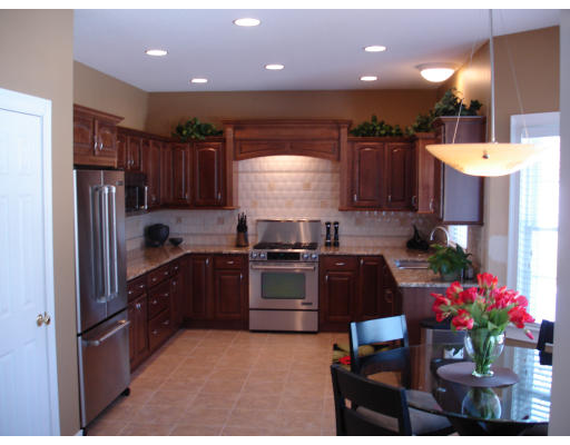 1340 Piper Road West Springfield, MA 01089 - Photo 3 of 10 a kitchen with refrigerator and cabinets