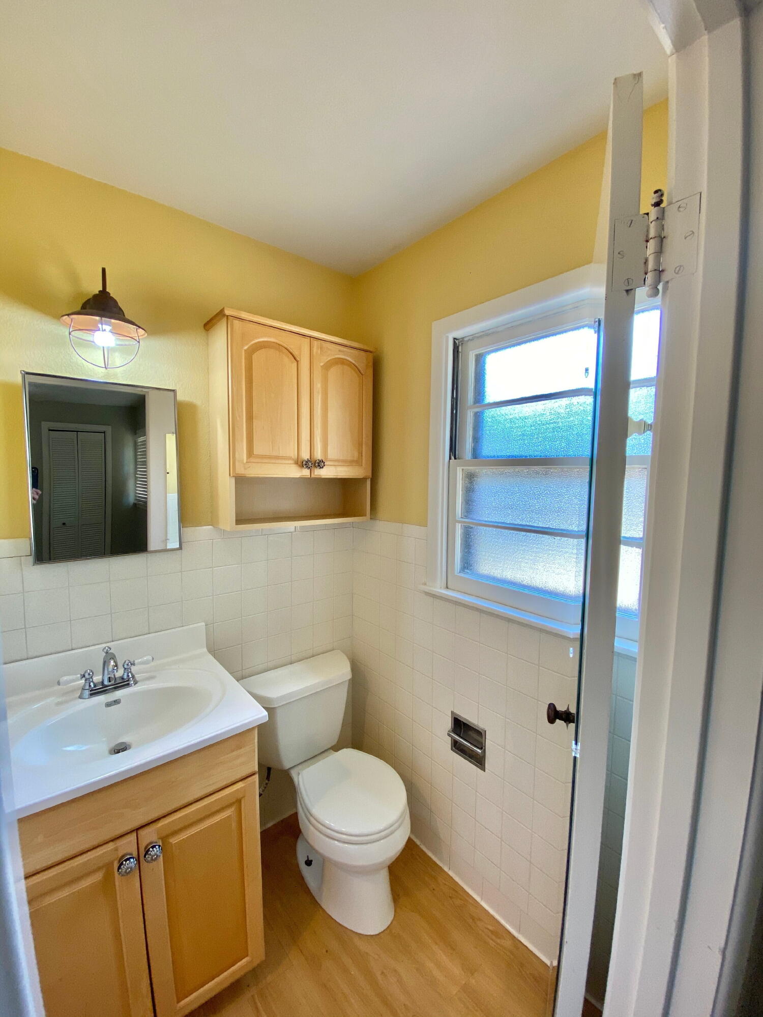 3509 37th Street Lubbock, TX 79413 - Photo 13 of 24 a bathroom with a granite countertop sink toilet and shower