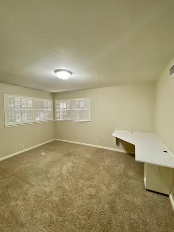a bathroom with a bathtub sink and toilet