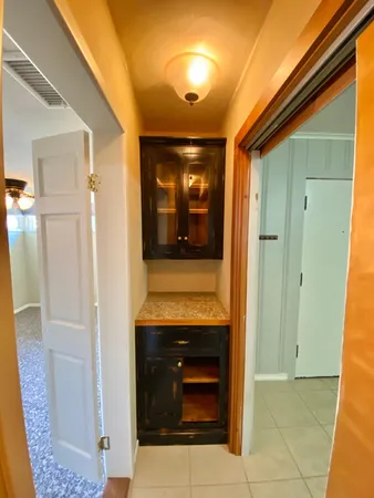 a view of an entryway and fire place
