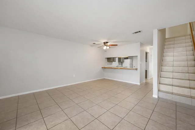 a view of kitchen and windows