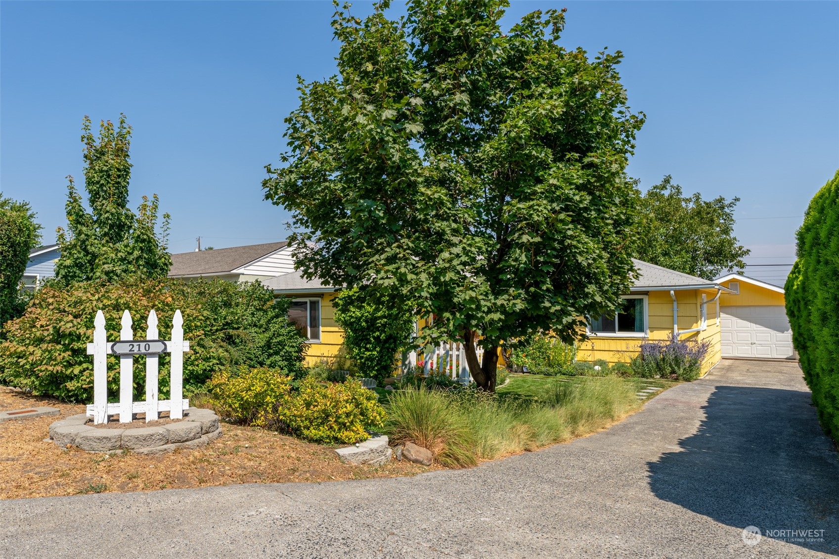210 Mocliff Road Ephrata, WA 98823 - Photo 25 of 25 a view of a house with pool plants and large trees