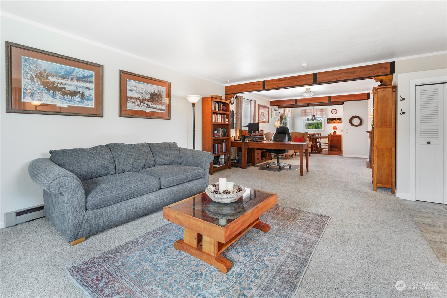 210 Mocliff Road Ephrata, WA 98823 - Photo 6 of 25 a living room with furniture potted plant and a large window