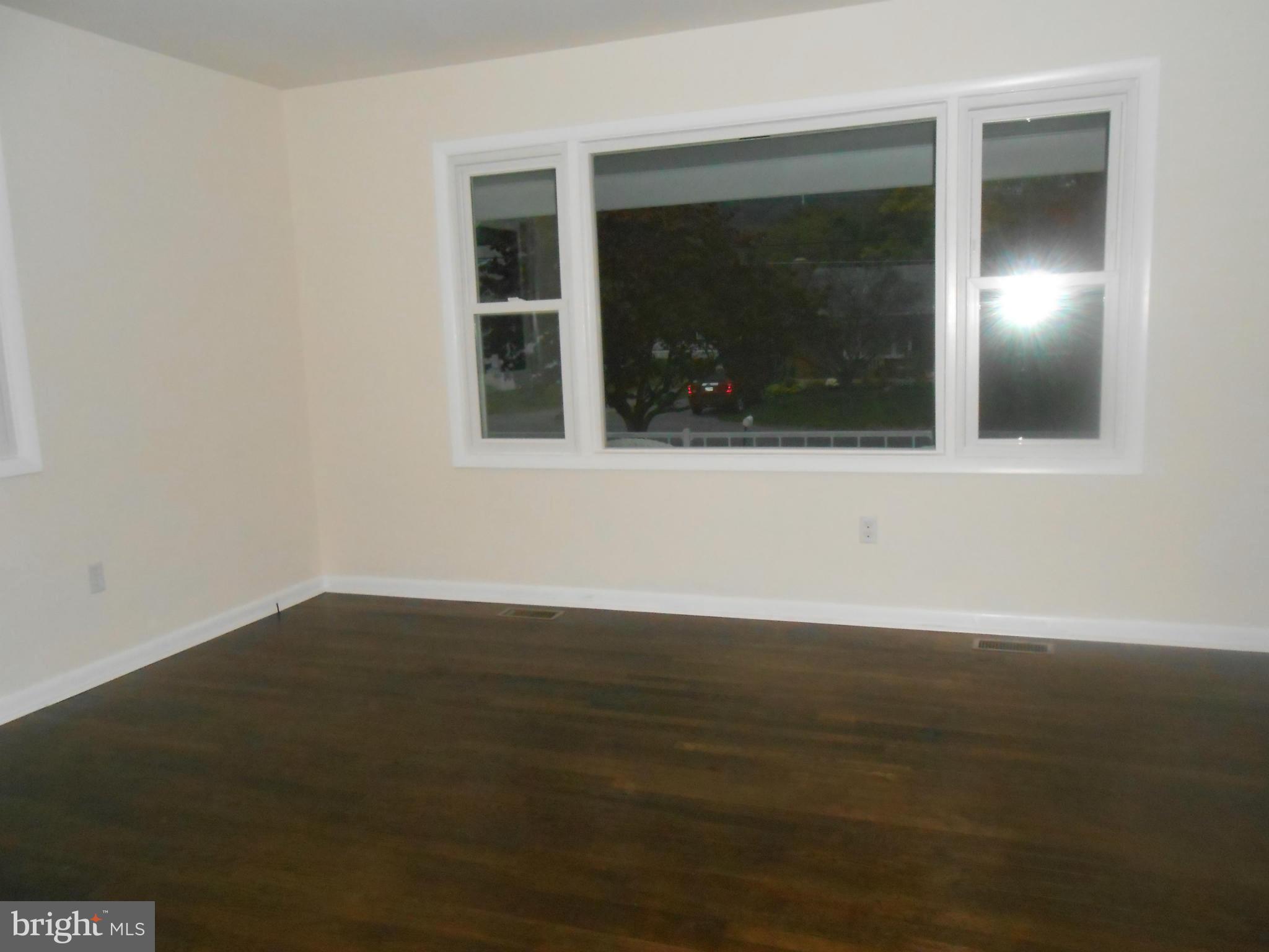 6212 Appletown Road Boonsboro, MD 21713 - Photo 7 of 19 Living Room has hardwood floors, new windows